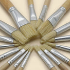 Close-up of bristle paint brush tips arranged in a radial star pattern
