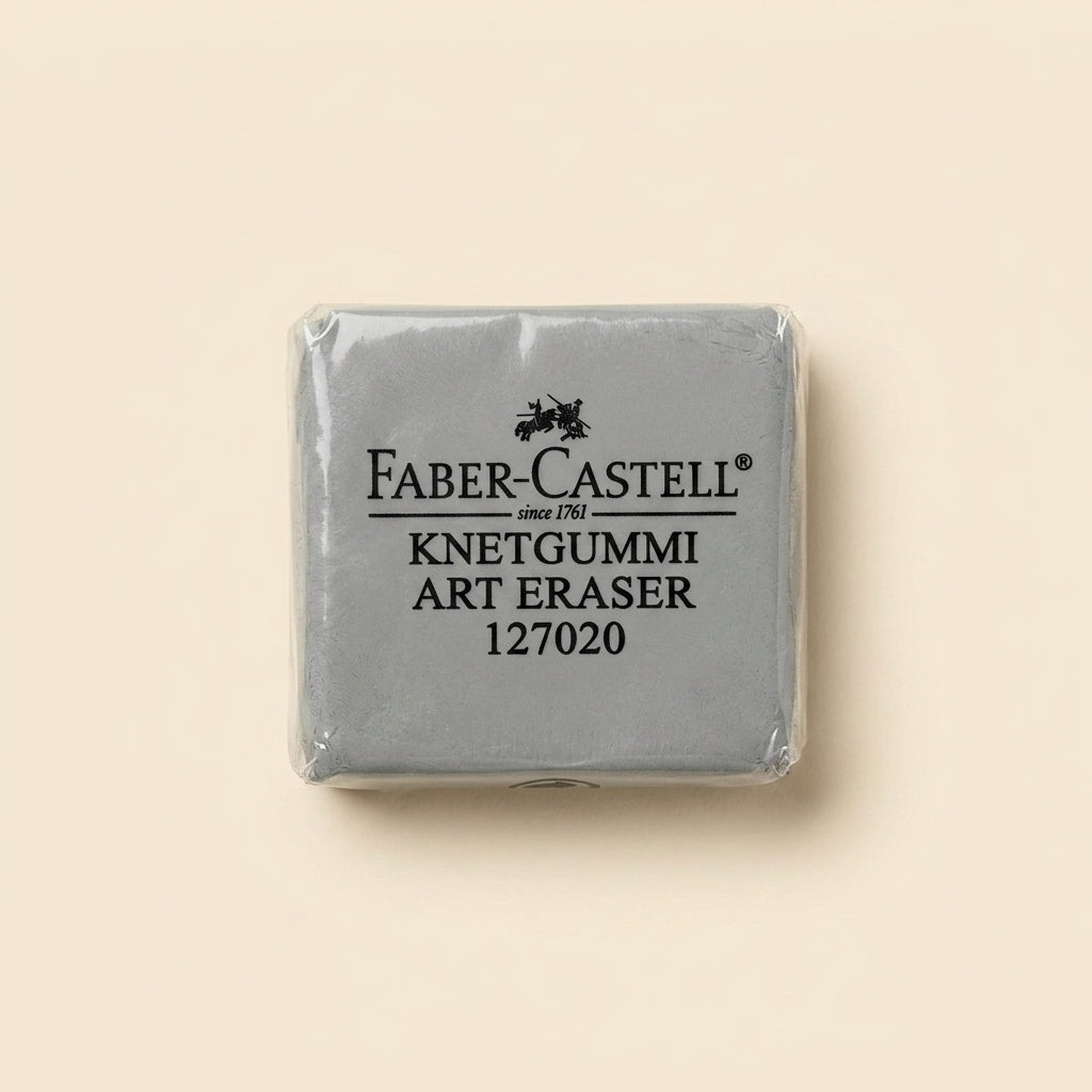 A single wrapped Faber-Castell Knetgummi Art Eraser, model 127020, shown on a solid light beige background.