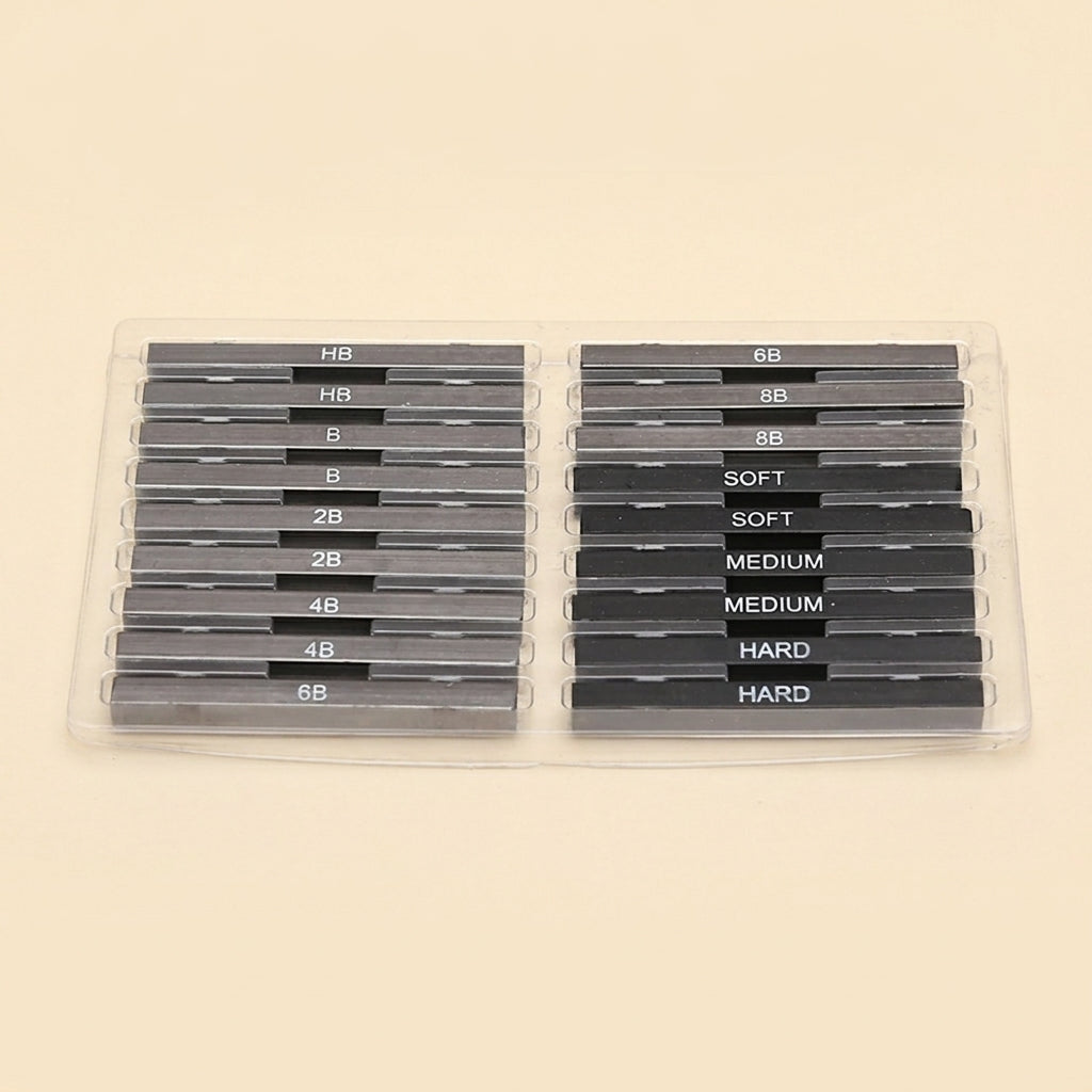 A clear plastic case containing multiple dark gray metal sharpening stones or grinding bars, arranged in two columns with white text labels including HB, 8B, 2B, 4B, 6B, SOFT, MEDIUM, and HARD, on a light beige background.