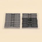 A clear plastic case containing multiple dark gray metal sharpening stones or grinding bars, arranged in two columns with white text labels including HB, 8B, 2B, 4B, 6B, SOFT, MEDIUM, and HARD, on a light beige background.
