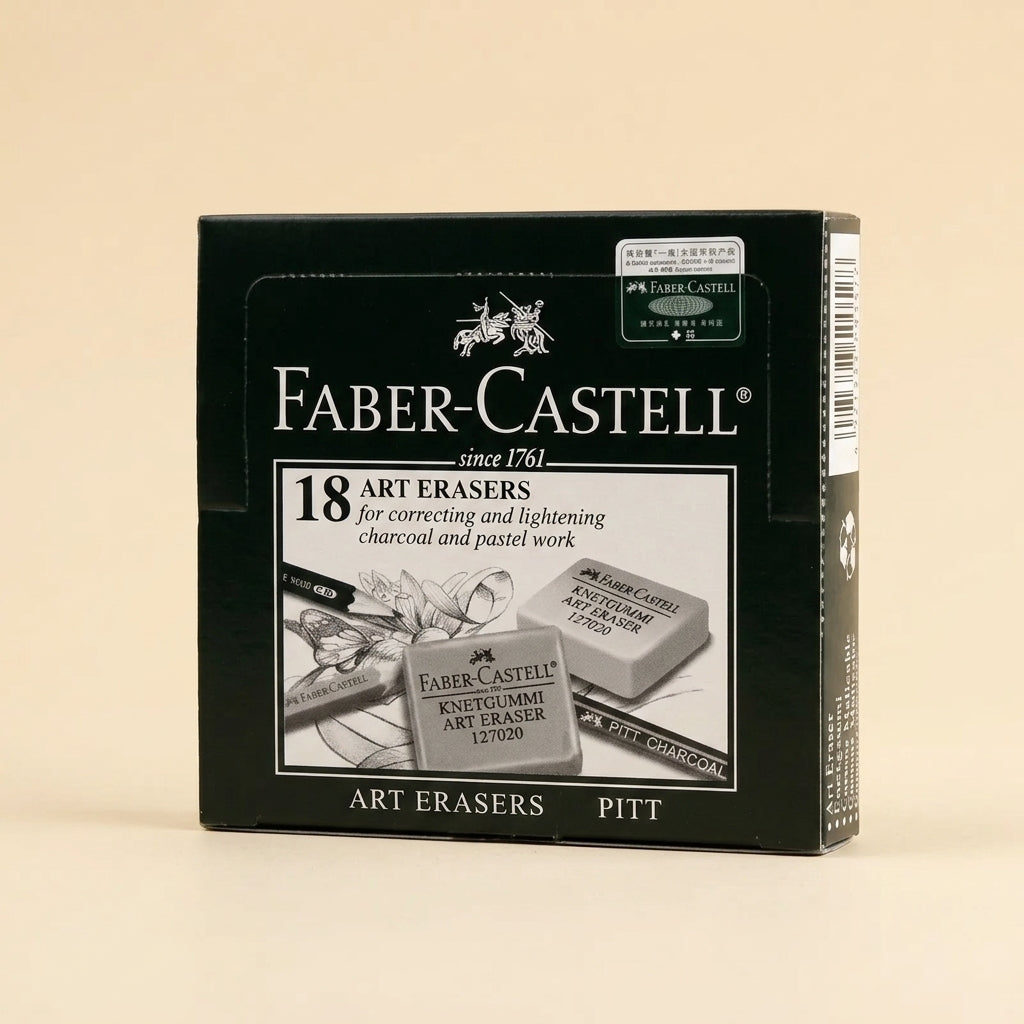 Faber-Castell 18 Kneaded Erasers in a black cardboard box, photographed on a solid beige background.