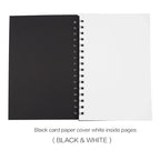 A spiral-bound sketchpad or card album shown open, with a black cover on the left and white interior pages on the right. Text below reads 'Black card paper cover white inside pages ( BLACK & WHITE )'.